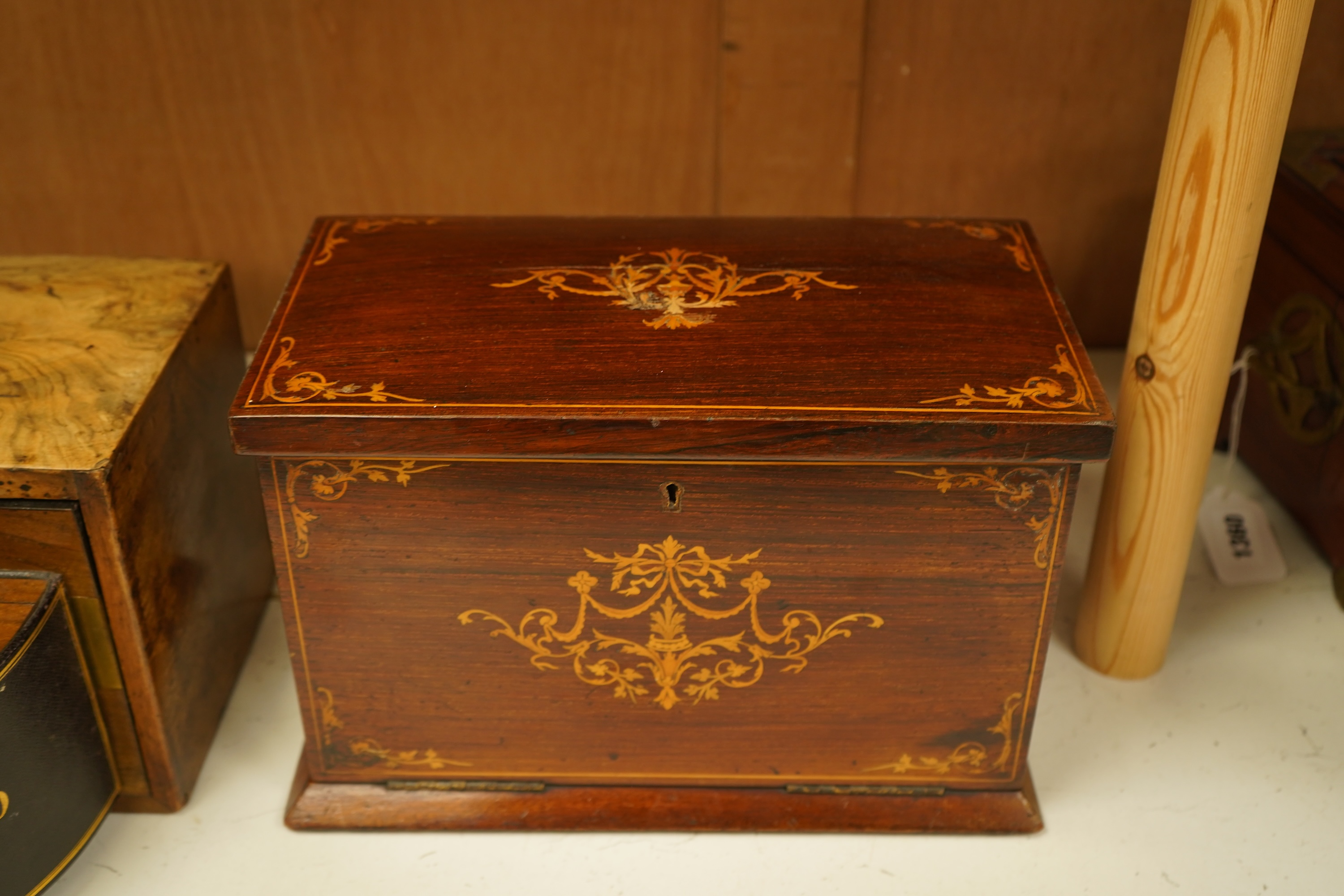 An Edwardian inlaid mahogany writing casket with fitted interior and a late Victorian faded walnut cigar box, largest 32cm wide